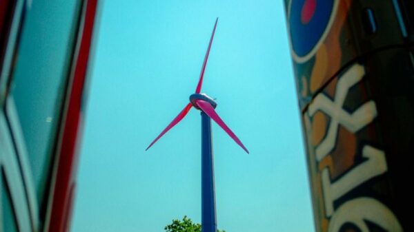 Glastonbury festival's tall new pink and purple turbine was installed at Worthy Farm by Octopus Energy last week (June 13)