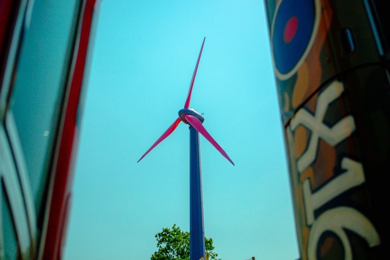 Glastonbury festival's tall new pink and purple turbine was installed at Worthy Farm by Octopus Energy last week (June 13)