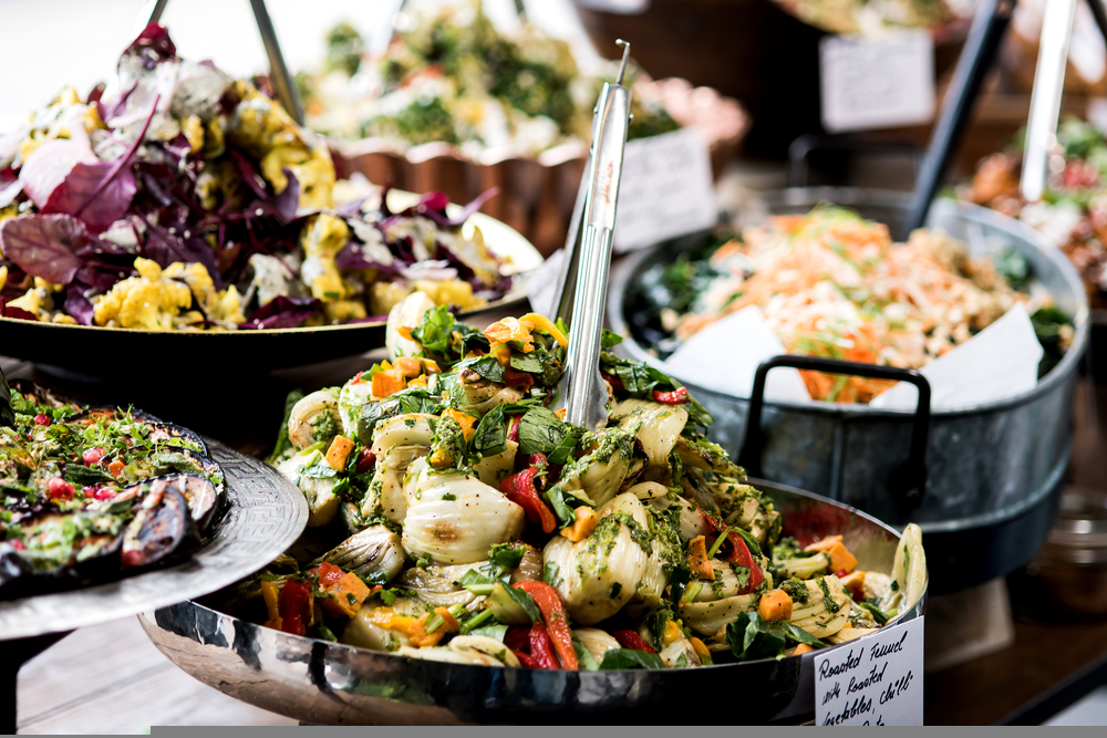 Cropped image of assorted salads in restaurant