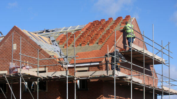 property building in progress to new house. 100 UK businesses have joined UKGBC to call for urgent reform to the planning system to tackle the UK’s deepening housing and climate crises.