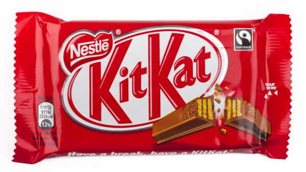 An unopened Kit Kat chocolate bar manufactured by Nestle, pictured over a plain white background on 6th May 2016.
