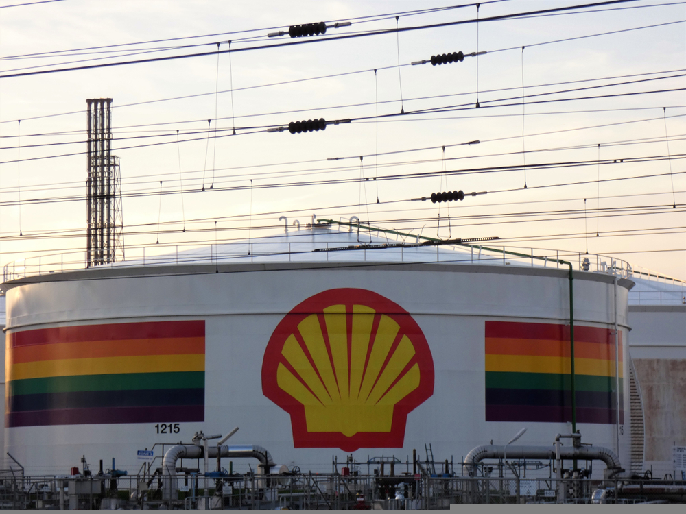 Shell oil storage tanks with LGBT rainbow coloured flag: re The British LGBT Awards