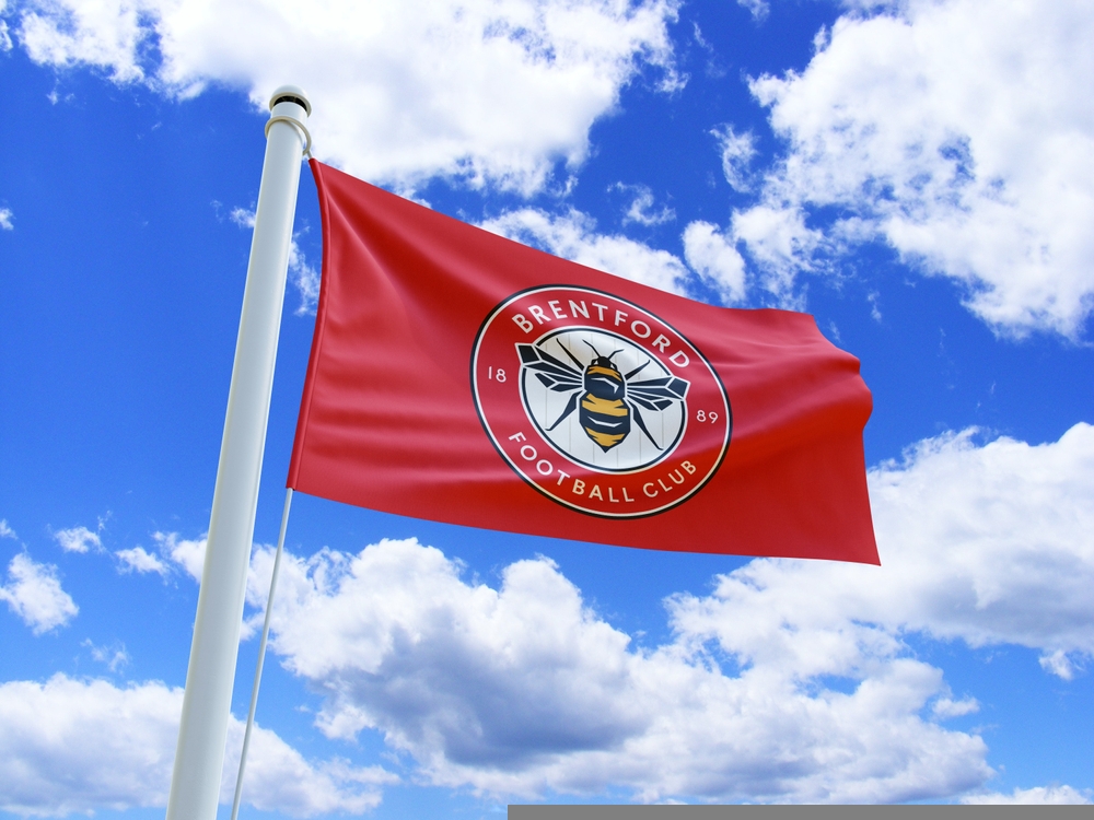 Waving flag of English football club Brentford F.C. - Brentford FC have been named top sustainable Premier League team by the Fair Game Index.