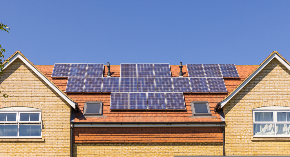 Solar panels on the roof of a new build home. UK - Octopus Energy has launched a Zero Build initiative that allows customers to move into homes with green energy technology.