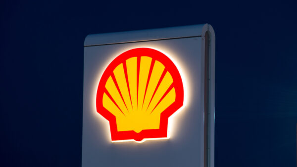 Shell logo on petrol station at night.