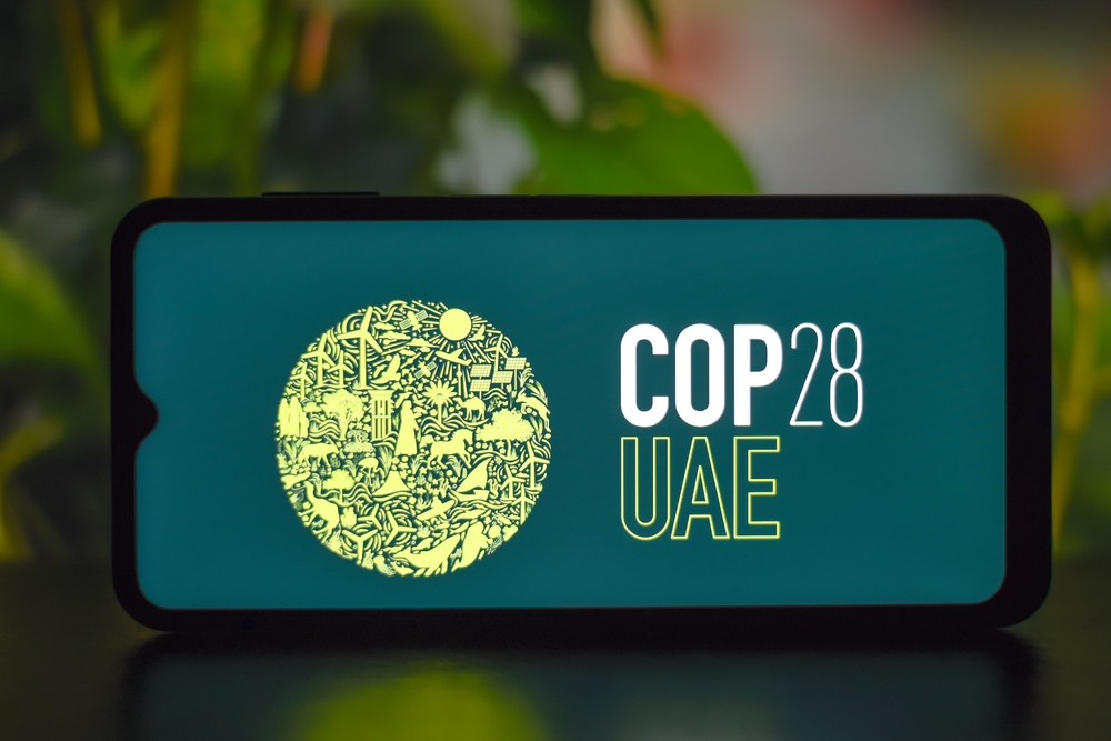 Selective focus of the 2023 COP28 UAE conference in Expo City Dubai logo