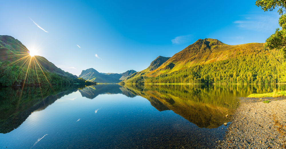 Morning panorama of Buttermere lake in the Lake District. England Santander UK has expanded its nature restoration partnerships with National Parks UK.