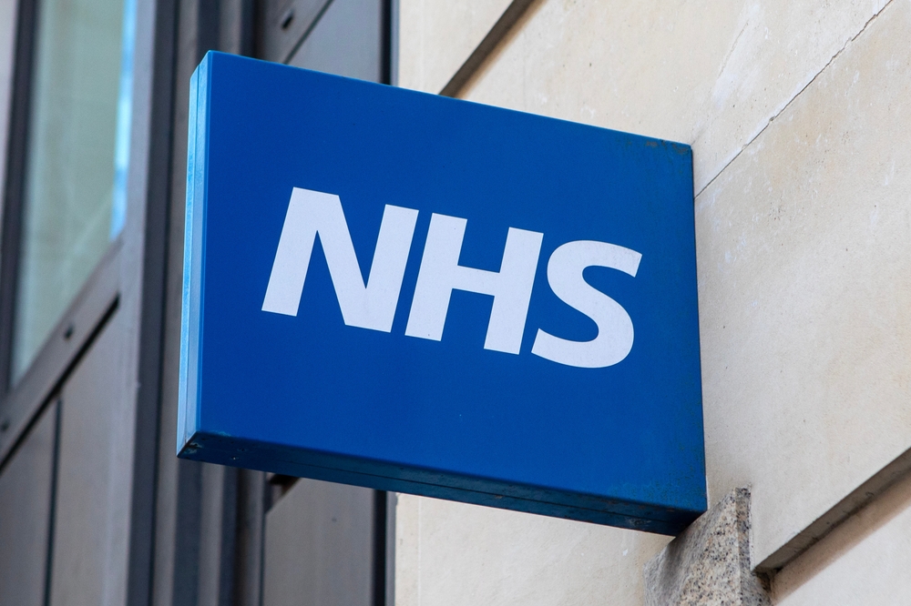 Close-up of an NHS - National Health Service - sign in London, UK.