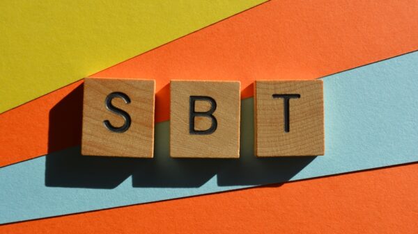 SBT, acronym for Science-Based Targets in wooden alphabet letters isolated on multicolored background