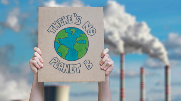 No Planet B sign next to factories - Stealth communications, cultural awareness of progressive and traditional values and not being urban centric are crucial for inspiring climate action among ‘persuadables’.