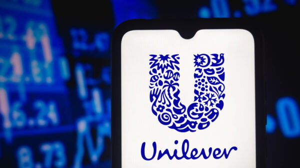 In this photo illustration the Unilever logo seen displayed on a smartphone screen