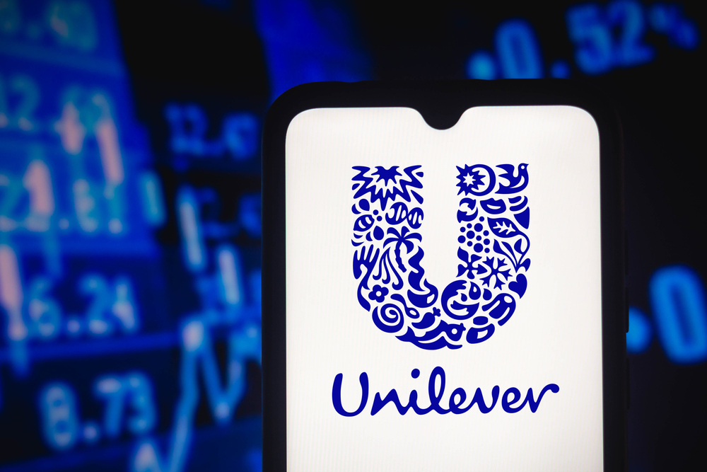 In this photo illustration the Unilever logo seen displayed on a smartphone screen