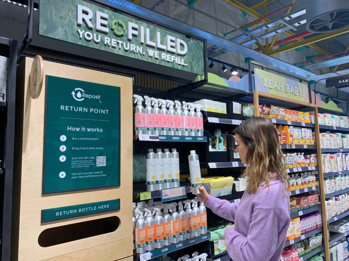 M&S customer browsing cleaning products in the retail store