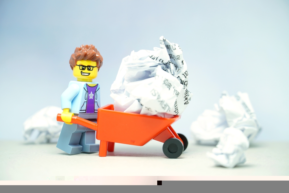 Mini toy of lego at table with blurred background.