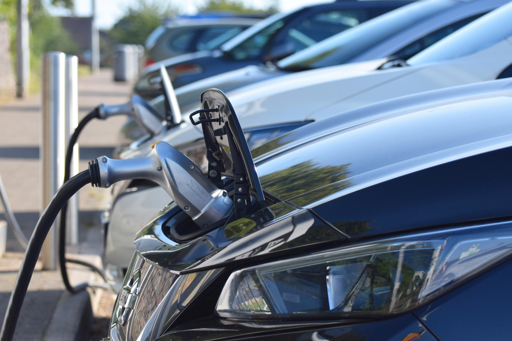 EVElectric cars charging at Electric Vehicle Charging Points at a British motorway service station