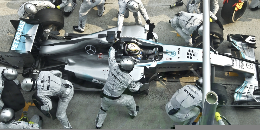 Driver Mercedes AMG Petronas F1, Nico Rosberg, entering crews does pit-stop practice at the 2014, F1 Petronas Malaysian Grand Prix at Sepang International Circuit.