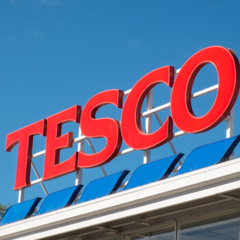 Tesco has hailed “significant progress” in reducing carbon emissions, as Britain’s biggest supermarket chain reported a near 13% rise in operating profits for the year.