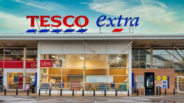 Tesco has cut its energy consumption by as much as 10% thanks to a trial which involves raising the temperature of its fridges by one degree.