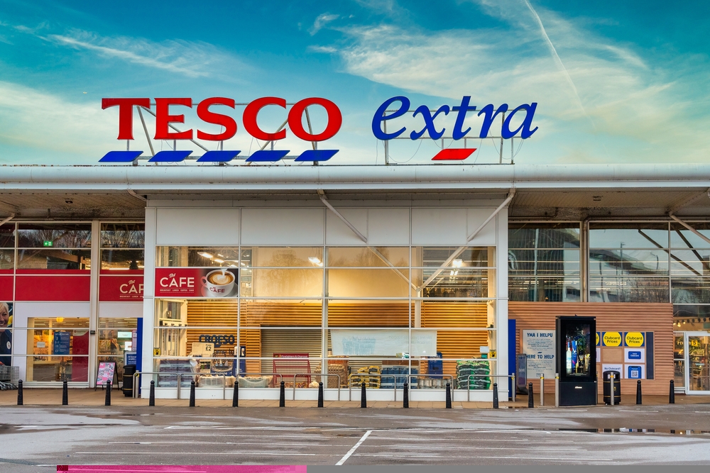 Tesco has cut its energy consumption by as much as 10% thanks to a trial which involves raising the temperature of its fridges by one degree.