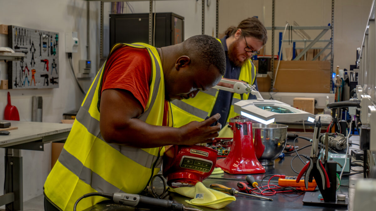 The KitchenAid repair team work on fixing the appliances. Home appliance brand KitchenAid has teamed up with repair, refurb and resell specialist Trojan, as it looks to beef up its repair operations and boost its sustainability credentials.
