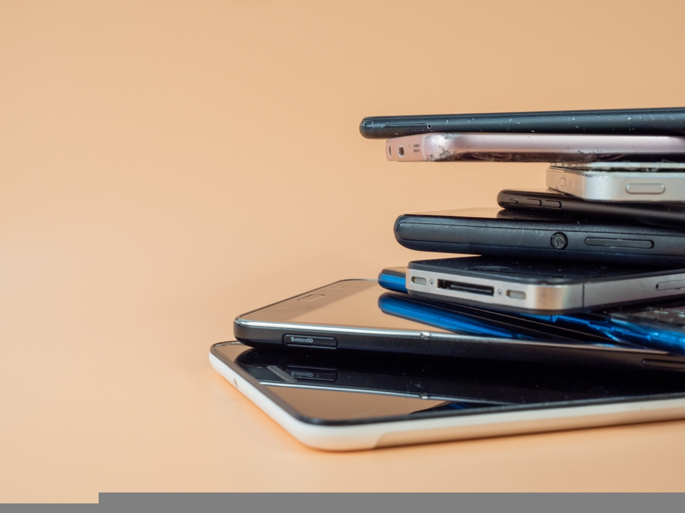 Brits are more likely to sit in a bath of baked beans or stay silent for 24 hours to raise money for charity than donate unused smartphones.